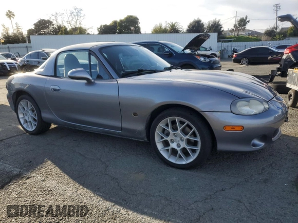 2002 Mazda MX-5 Miata Cloth with VIN JM1NB353X20228420, listed as a Copart auction lot 47949235 with 94,341 mi miles and Salvage title. Bid and sale history available at DreamBid. Image 4.