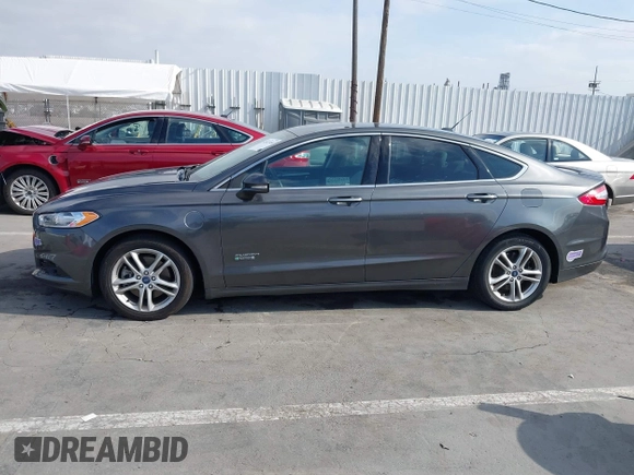 2016 Ford Fusion Titanium with VIN 3FA6P0SU9GR145186, listed as a IAAI auction lot 42023484 with 84,399 mi miles and . Bid and sale history available at DreamBid. Image 14.