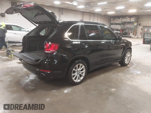2016 BMW X5 xDrive35i with VIN 5UXKR0C57G0S85956, listed as a IAAI auction lot 41708072 with 409,161 mi miles. Bid and sale history available at carsss.com. Image 4.