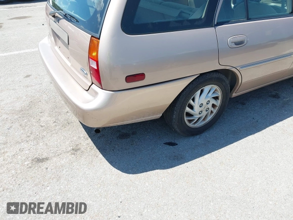 1999 Ford Escort SE z VIN 3FAFP15P9XR164302, wystawiony jako IAAI lot #42379366 z przebiegiem 111 509 mil mil oraz . Historia ofert i sprzedaży dostępna na DreamBid. Obrazek 6.