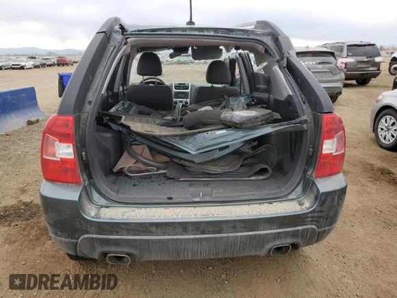 2009 Kia Sportage LX with VIN KNDJE723297575825, listed as a Copart auction lot 51069125 with 95,178 mi miles and Salvage Title. Bid and sale history available at carsss.com. Image 6.