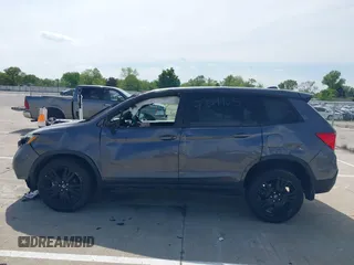 2019 Honda Passport Sport with VIN 5FNYF8H27KB002001, listed as a IAAI auction lot 42299635 with 54,542 mi miles and . Bid and sale history available at DreamBid. Image 13.
