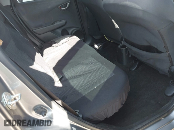 2009 Honda Fit with VIN JHMGE88239S025012, listed as a IAAI auction lot 42584028 with 163,965 mi miles and . Bid and sale history available at DreamBid. Image 8.