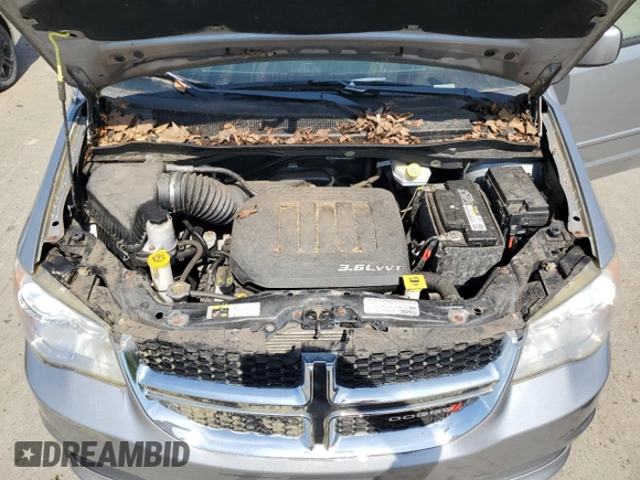 2013 Dodge Grand Caravan SXT with VIN 2C4RDGCG9DR628406, listed as a Copart auction lot 56484915 with 16,823 mi miles and Clean Title. Bid and sale history available at DreamBid. Image 12.