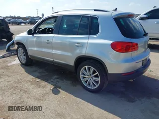 2013 Volkswagen Tiguan SE with VIN WVGAV7AX4DW545658, listed as a IAAI auction lot 41523168 with 188,729 mi miles and . Bid and sale history available at DreamBid. Image 3.