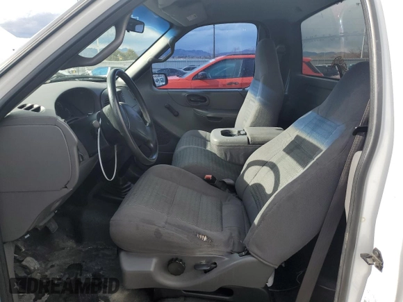 2002 Ford F-150 XL with VIN 1FTRF17212KC06180, listed as a Copart auction lot 45336625 with 214,139 mi miles and Salvage title. Bid and sale history available at DreamBid. Image 7.