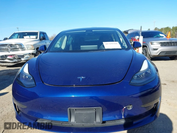 2022 Tesla Model 3 Long Range with VIN 5YJ3E1EB1NF257059, listed as a IAAI auction lot 41329318 with 30,652 mi miles and . Bid and sale history available at DreamBid. Image 12.