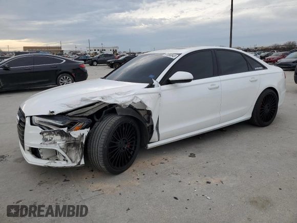 2015 Audi A6 3.0T Prestige with VIN WAUHGAFCXFN031884, listed as a Copart auction lot 41890843 with 136,077 mi miles. Bid and sale history available at carsss.com. Image 1.