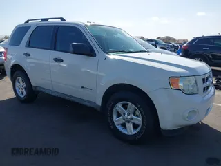 2009 Ford Escape Hybrid with VIN 1FMCU49389KB29641, listed as a IAAI auction lot 41728859 with 131,596 mi miles. Bid and sale history available at carsss.com. Image 1.