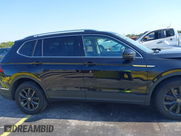 2024 Volkswagen Tiguan SE with VIN 3VVNB7AXXRM199400, listed as a IAAI auction lot 42216941 with 11,581 mi miles and . Bid and sale history available at DreamBid. Image 13.