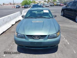 2001 Ford Mustang Standard z VIN 1FAFP404X1F217978, wystawiony jako IAAI lot #42569548 z przebiegiem 199 730 mil mil oraz . Historia ofert i sprzedaży dostępna na DreamBid. Obrazek 6.