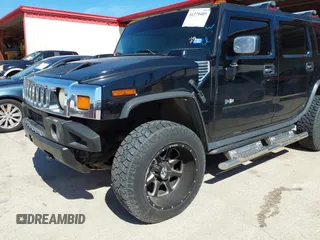 2004 Hummer H2 with VIN 5GRGN23U64H101592, listed as a IAAI auction lot 41379405 with 174,672 mi miles. Bid and sale history available at carsss.com. Image 2.