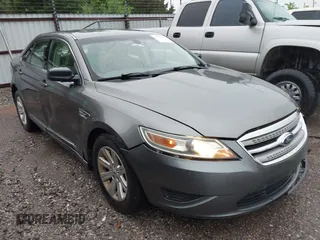 2011 Ford Taurus SE with VIN 1FAHP2DW2BG181059, listed as a IAAI auction lot 42036867 with 103,394 mi miles. Bid and sale history available at carsss.com. Image 1.