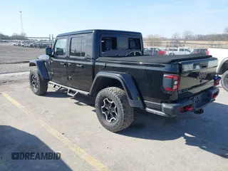 2020 Jeep Gladiator Rubicon with VIN 1C6JJTBG9LL152141, listed as a IAAI auction lot 41798487 with 78,585 mi miles and . Bid and sale history available at DreamBid. Image 3.
