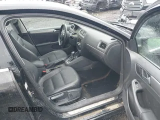 2014 Volkswagen Jetta TDI w/Premium with VIN 3VWLL7AJ1EM406360, listed as a IAAI auction lot 41857580 with 93,333 mi miles and . Bid and sale history available at DreamBid. Image 5.