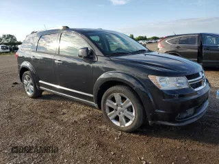 2011 Dodge Journey Crew with VIN 3D4PG3FG5BT521689, listed as a Copart auction lot 62148065 with 105,101 mi miles and Salvage title. Bid and sale history available at DreamBid. Image 4.