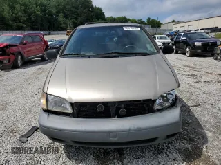 2000 Toyota Sienna LE z VIN 4T3ZF13C7YU259075, wystawiony jako Copart lot #58416105 z przebiegiem 235 788 mil mil oraz Szkoda całkowita • Salvage title. Historia ofert i sprzedaży dostępna na DreamBid. Obrazek 5.