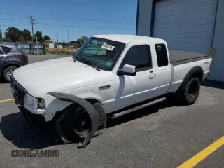 2010 Ford Ranger XLT with VIN 1FTLR4FE4APA21472, listed as a Copart auction lot 63842785 with 122,911 mi miles and Salvage title. Bid and sale history available at DreamBid. Image 1.