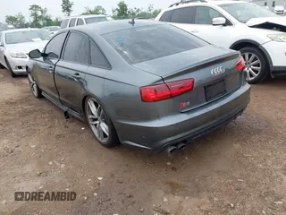 2016 Audi S6 Prestige z VIN WAUH2AFC1GN016187, wystawiony jako IAAI lot #42274744 z przebiegiem 169 821 mil mil oraz . Historia ofert i sprzedaży dostępna na DreamBid. Obrazek 3.