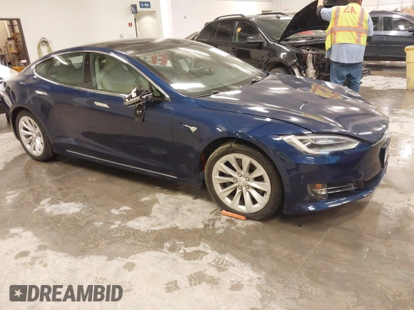 2018 Tesla Model S 75D with VIN 5YJSA1E24JF276044, listed as a IAAI auction lot 41798530 with 53,462 mi miles and . Bid and sale history available at DreamBid. Image 1.