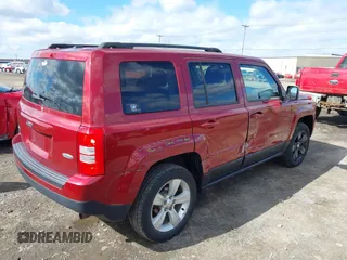 2014 Jeep Patriot Latitude with VIN 1C4NJRFB4ED897890, listed as a IAAI auction lot 41978399 with 76,688 mi miles. Bid and sale history available at carsss.com. Image 4.
