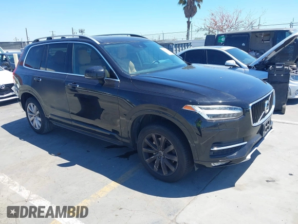 2016 Volvo XC90 T6 Momentum with VIN YV4A22PK1G1074286, listed as a IAAI auction lot 42202492 with 104,791 mi miles and . Bid and sale history available at DreamBid. Image 1.