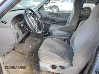 1998 Ford F-150 XL with VIN 1FTRX17L6WNB25038, listed as a Copart auction lot 78741914 with 173,972 mi miles and Salvage title. Bid and sale history available at DreamBid. Image 7.