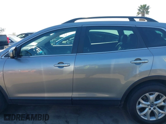 2013 Mazda CX-9 Touring z VIN JM3TB2CVXD0416533, wystawiony jako IAAI lot #42223034 z przebiegiem 135 990 mil mil oraz . Historia ofert i sprzedaży dostępna na DreamBid. Obrazek 14.