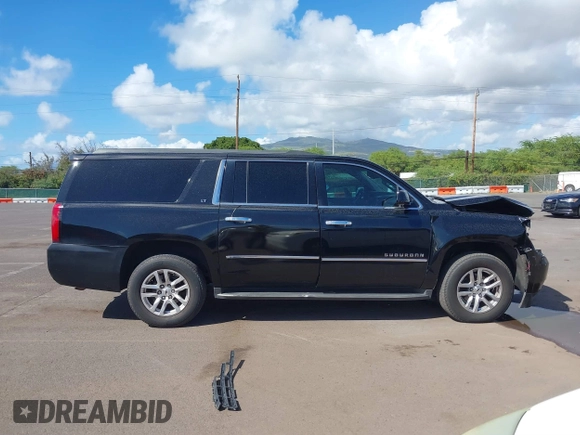 2016 Chevrolet Suburban LT with VIN 1GNSCHKC5GR288312, listed as a IAAI auction lot 41681664 with 195,619 mi miles and . Bid and sale history available at DreamBid. Image 14.