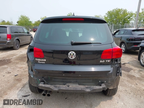 2013 Volkswagen Tiguan S with VIN WVGAV3AX2DW594334, listed as a IAAI auction lot 42405989 with 96,559 mi miles and . Bid and sale history available at DreamBid. Image 16.