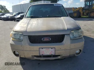 2007 Ford Escape Limited with VIN 1FMCU04177KA09776, listed as a Copart auction lot 60784535 with 175,679 mi miles and Salvage title. Bid and sale history available at DreamBid. Image 5.