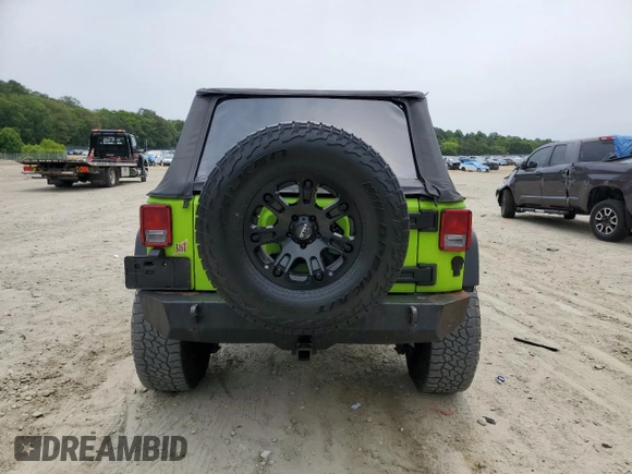 2013 Jeep Wrangler Unlimited Sport z VIN 1C4BJWDG6DL505416, wystawiony jako Copart lot #59910525 z przebiegiem 115 908 mil mil oraz Czysty tytuł • Clean title. Historia ofert i sprzedaży dostępna na DreamBid. Obrazek 6.