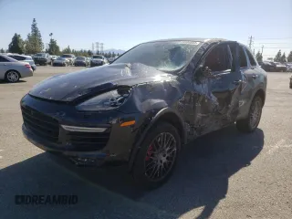 2016 Porsche Cayenne Turbo z VIN WP1AC2A2XGLA89185, wystawiony jako Copart lot #39584803 z przebiegiem 75 071 mil mil oraz . Historia ofert i sprzedaży dostępna na DreamBid. Obrazek 1.