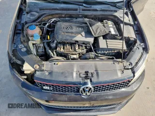 2014 Volkswagen Jetta GLI Edition 30 z VIN 3VW4S7AJ1EM390796, wystawiony jako Copart lot #61292085 z przebiegiem 138 224 mil mil oraz Czysty tytuł • Clean title. Historia ofert i sprzedaży dostępna na DreamBid. Obrazek 11.