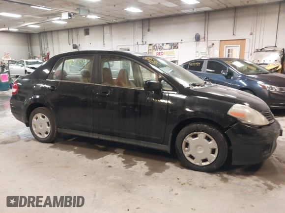 2007 Nissan Versa 1.8 SL with VIN 3N1BC11E47L411983, listed as a IAAI auction lot 41391334 with 201,830 mi miles. Bid and sale history available at carsss.com. Image 14.