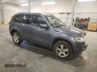 2007 Suzuki Grand Vitara Luxury z VIN JS3TD947774200407, wystawiony jako Copart lot #52001965 z przebiegiem Nie podano mil oraz Szkoda całkowita • Salvage title. Historia ofert i sprzedaży dostępna na DreamBid. Obrazek 4.