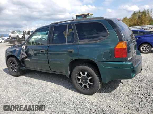 2005 GMC Envoy SLT with VIN 1GKDT13S952144349, listed as a Copart auction lot 71800694 with 137,614 mi miles and Salvage Title. Bid and sale history available at DreamBid. Image 2.