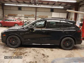 2016 Porsche Cayenne GTS z VIN WP1AD2A29GLA72438, wystawiony jako IAAI lot #41279805 z przebiegiem 29 769 mil mil oraz . Historia ofert i sprzedaży dostępna na DreamBid. Obrazek 14.