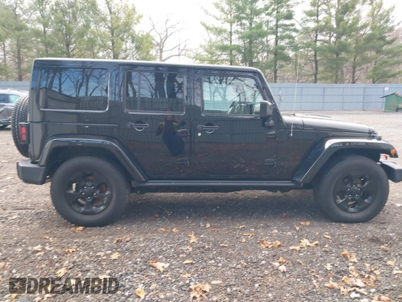 2015 Jeep Wrangler Unlimited Sahara with VIN 1C4HJWEG0FL661723, listed as a IAAI auction lot 41998393 with 89,077 mi miles. Bid and sale history available at carsss.com. Image 13.