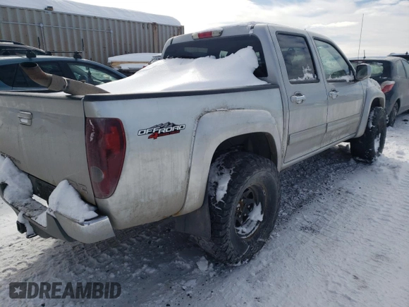 2011 GMC Canyon SLT with VIN 1GTH6NFE2B8117617, listed as a Copart auction lot 43222695 with 146,277 mi miles and Salvage Title. Bid and sale history available at carsss.com. Image 3.