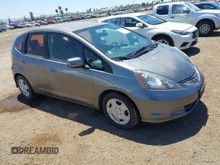 2013 Honda Fit z VIN JHMGE8H34DC082914, wystawiony jako IAAI lot #42288271 z przebiegiem 186 269 mil mil oraz . Historia ofert i sprzedaży dostępna na DreamBid. Obrazek 1.