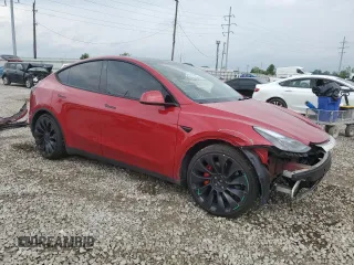 2022 Tesla Model Y Performance with VIN 7SAYGDEF8NF514662, listed as a Copart auction lot 60230305 with 81,926 mi miles and Salvage title. Bid and sale history available at DreamBid. Image 4.