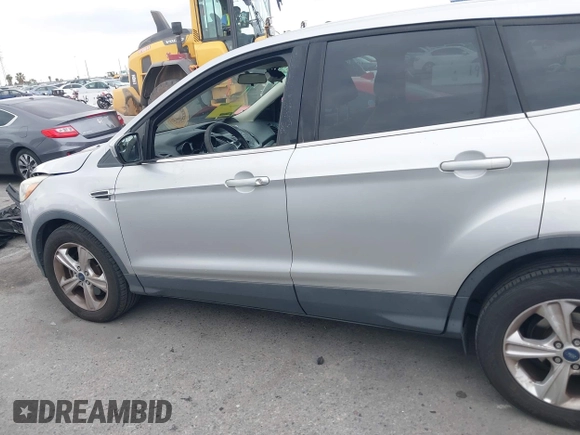 2015 Ford Escape SE with VIN 1FMCU0G95FUC81490, listed as a IAAI auction lot 42136791 with 140,967 mi miles. Bid and sale history available at carsss.com. Image 14.