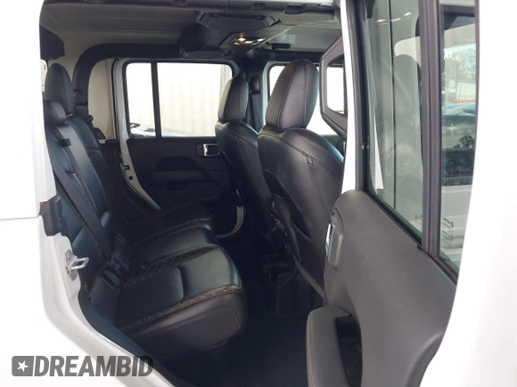 2023 Jeep Gladiator Overland with VIN 1C6HJTFG7PL543870, listed as a IAAI auction lot 42056969 with 28,655 mi miles and . Bid and sale history available at DreamBid. Image 8.
