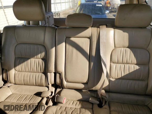 1999 Lexus LX 470 z VIN JT6HT00W0X0069481, wystawiony jako Copart lot #43588185 z przebiegiem 297 554 mil mil oraz Szkoda całkowita • Salvage title. Historia ofert i sprzedaży dostępna na DreamBid. Obrazek 10.