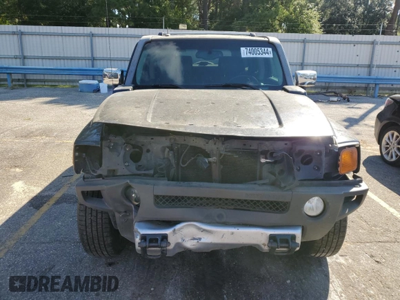 2009 Hummer H3 SUV with VIN 5GTEN13E098160892, listed as a Copart auction lot 74005344 with 224,542 mi miles and Salvage Title. Bid and sale history available at carsss.com. Image 5.