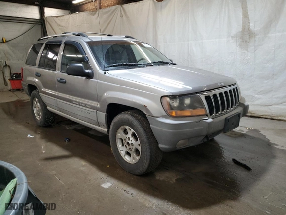 1999 Jeep Grand Cherokee Laredo with VIN 1J4GW58N0XC686845, listed as a Copart auction lot 48877805 with 155,908 mi miles and Clean Title. Bid and sale history available at carsss.com. Image 4.