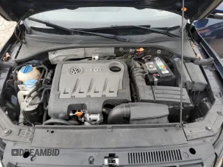 2013 Volkswagen Passat SEL Premium z VIN 1VWCN7A3XDC073524, wystawiony jako Copart lot #46759305 z przebiegiem 118 780 mil mil oraz Szkoda całkowita • Salvage title. Historia ofert i sprzedaży dostępna na DreamBid. Obrazek 13.