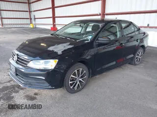 2016 Volkswagen Jetta Sedan 1.4T SE with VIN 3VWD67AJ8GM316539, listed as a IAAI auction lot 41870438 with 114,432 mi miles. Bid and sale history available at carsss.com. Image 2.