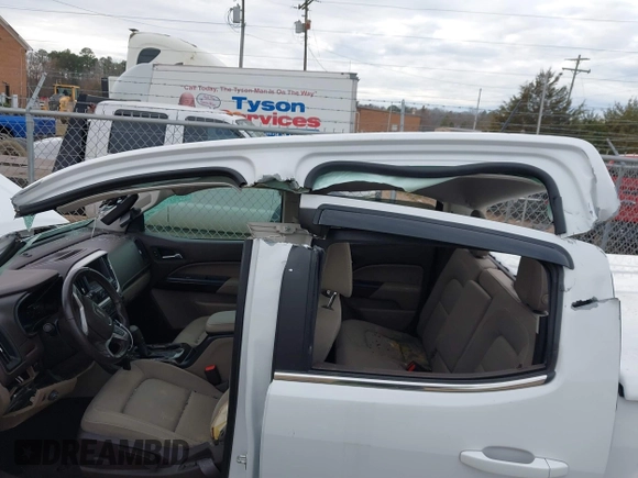 2015 GMC Canyon 2WD SLE with VIN 1GTG5BE33F1132736, listed as a IAAI auction lot 41094687 with 26,185 mi miles. Bid and sale history available at carsss.com. Image 6.